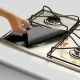 Комплект тефлонових накладок для газової плити з антипригарним покриттям чорного кольору 27x27 см 10 шт.